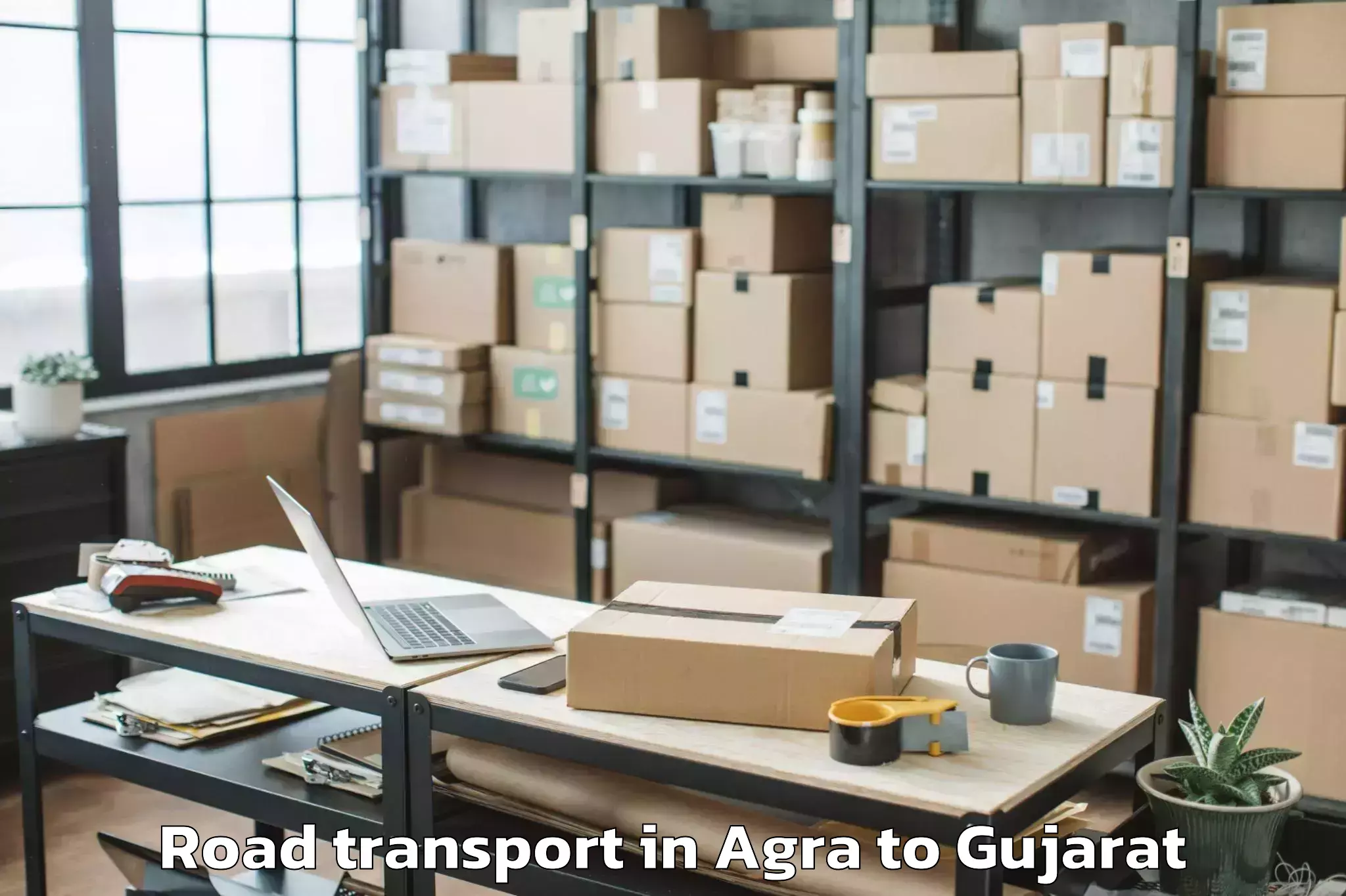 Book Your Agra to Gadhada Road Transport Today